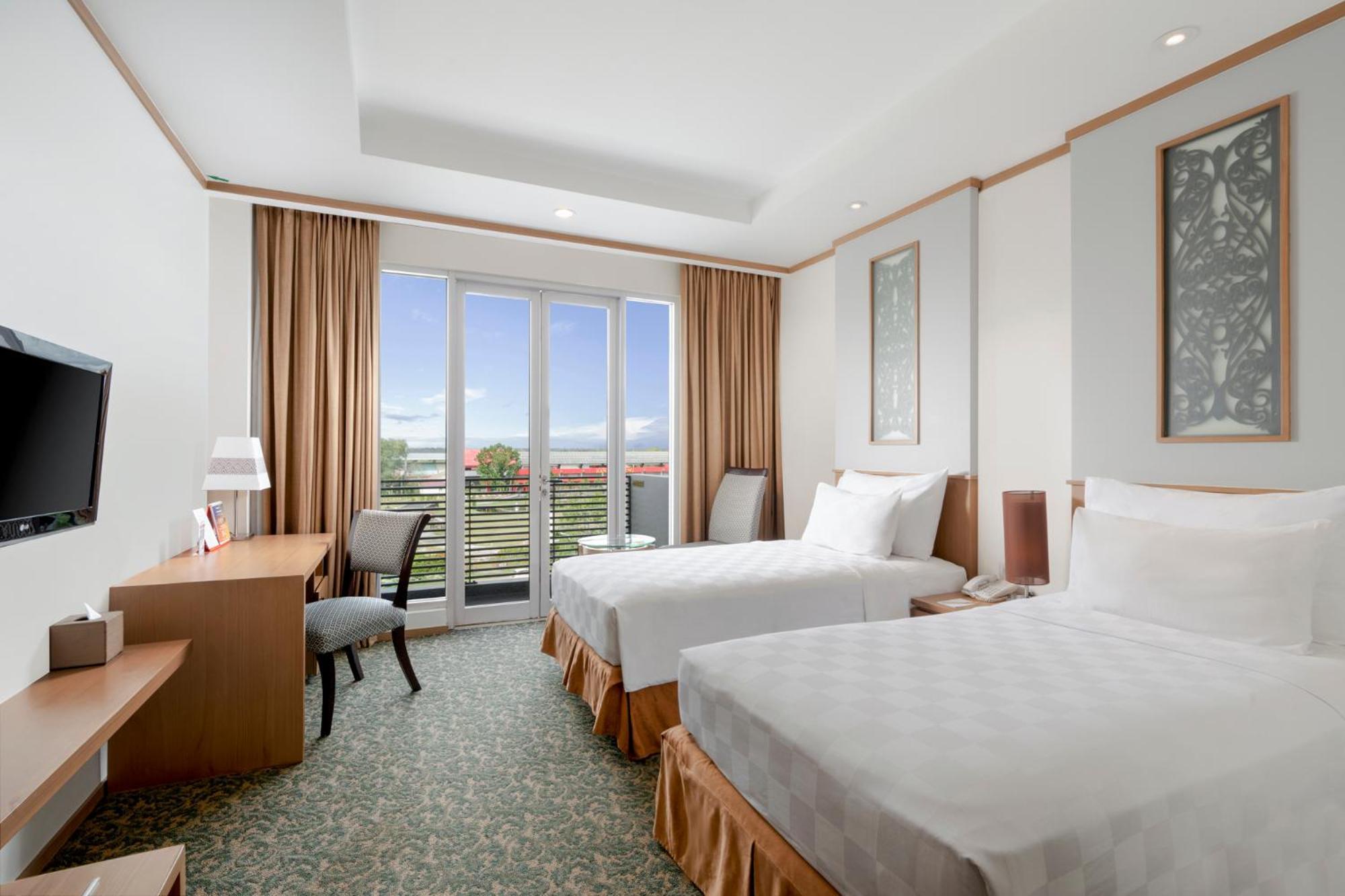 Swiss-Belhotel Danum Palangka Raya Zimmer foto